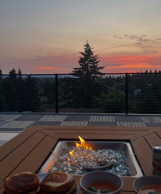 The fire pit going at sunset