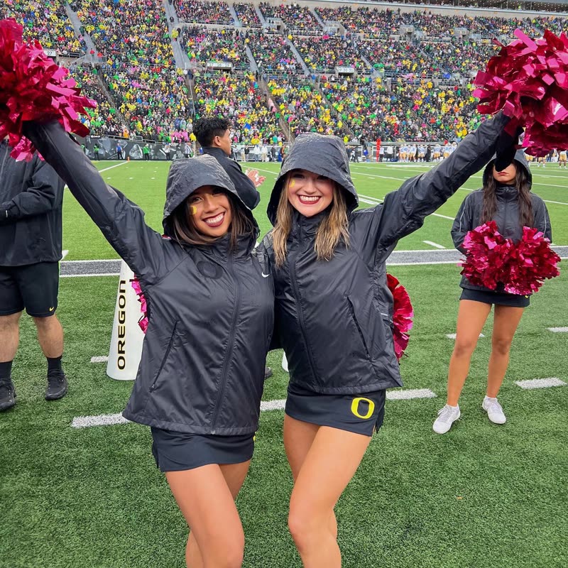 A rainy game day, full stadium behind her